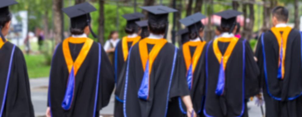 Blurred image back side view a group higher education graduation of graduates during commencement. Congratulation in University concept, Education concept.