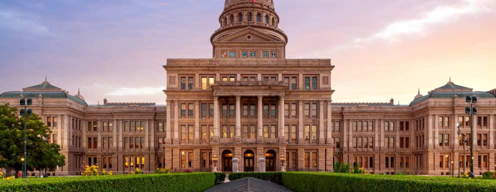 Sunset over the Texas Capitol building in Austin, Texas.