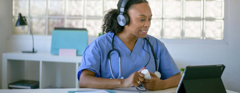 Nurse explaining medications on video call