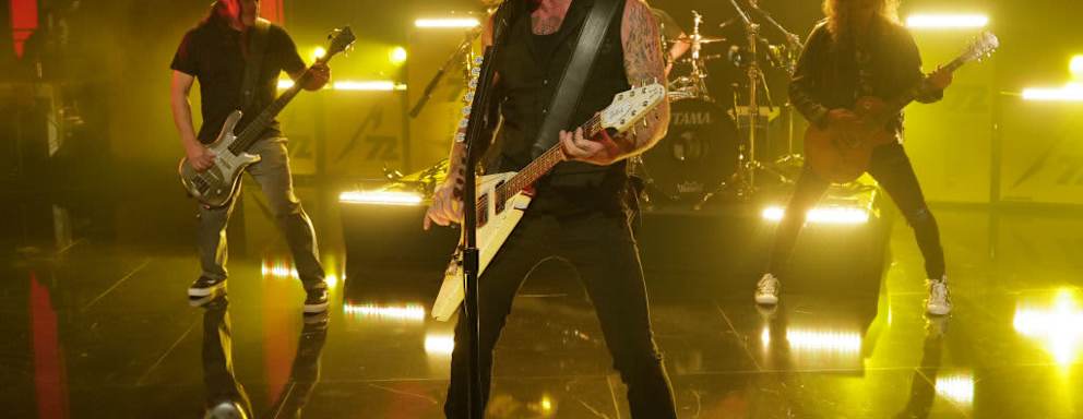 Metallica playing on stage at the "Jimmy Kimmel Live!" show.