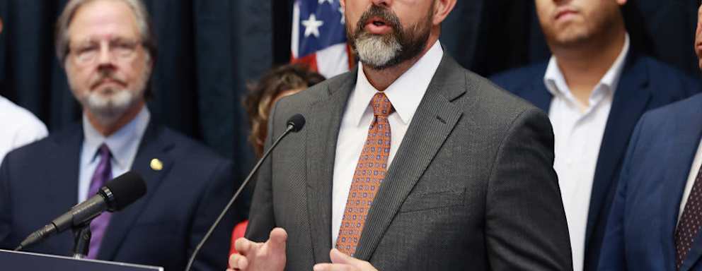 Florida education commissioner Manny Diaz Jr. speaks during a news conference at Crooms Academy of Information Technology on June 30, 2022, in Sanford, Florida.