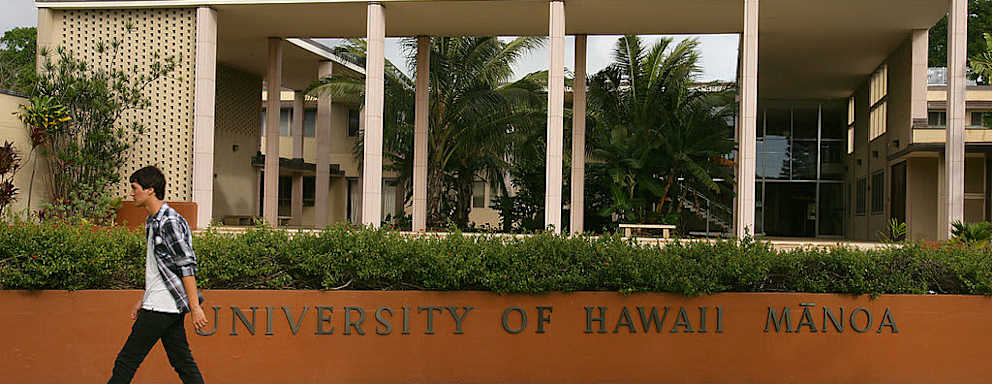 A student walks on campus at the University of Hawaii Manoa in Honolulu.