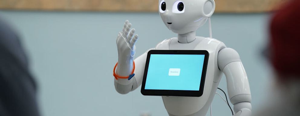 Robotic assistant with screen in nursing home