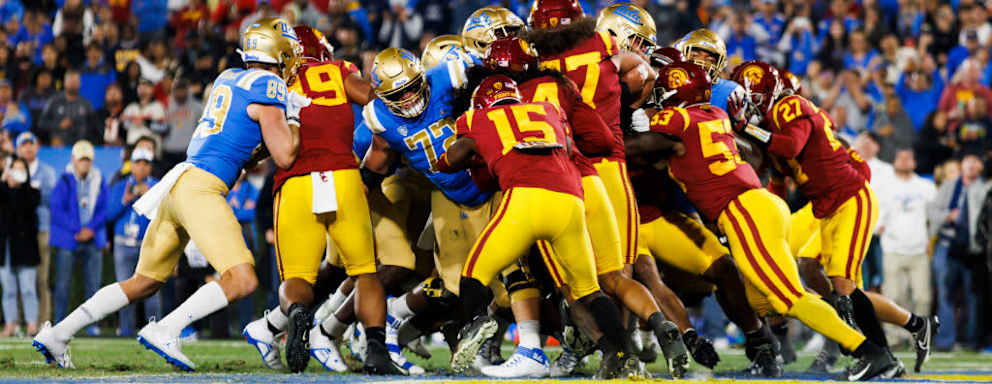USC Trojans defensive unit group tackle during the NCAA college football game between the USC Trojans and the UCLA Bruins on November 19, 2022 at the Rose Bowl Stadium in Pasadena, California.