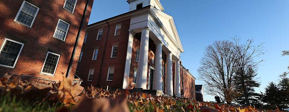 Amherst College campus building in autumn