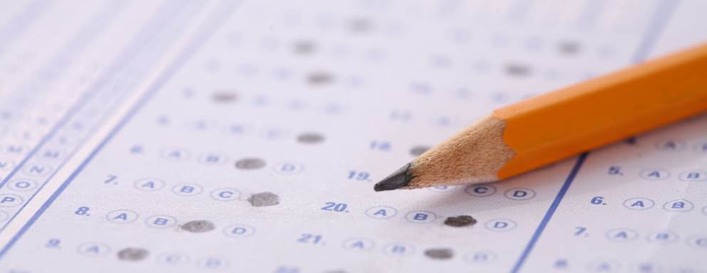 Bubble Sheet Test with Pencil, shallow focus on pencil.