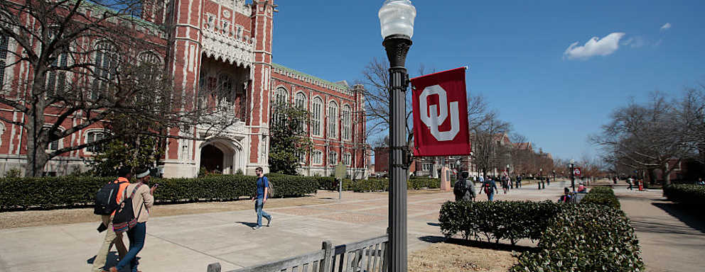 Students walking between classes on Oklahoma University's campus