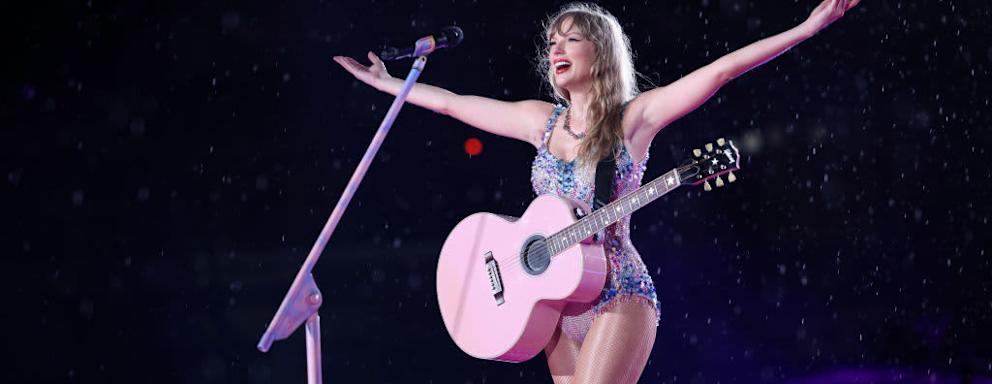 Taylor Swift singing at her Eras Tour concert in Rio de Janeiro