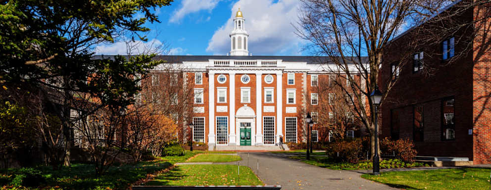 Exterior of the Harvard Business School on the Harvard campus in Boston, Massachusetts. It includes the Baker Library, built in 1927, and the Bloomberg Center, completed in 2005. Named to honor William H. Bloomberg, the late father of NYC former mayor Michael Bloomberg.