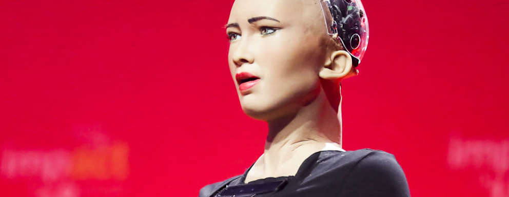 Sophia the Robot speaking on stage at the Impact18 Congress event held in Krakow, Poland.