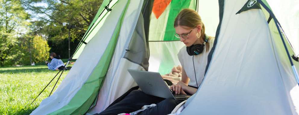 Demonstrators occupy a makeshift protest camp on Parish Beach at Swarthmore College on April 24, 2024 in Swarthmore, Pennsylvania. The encampment protesting Israel's treatment of Palestinians was erected by students in solidarity with similar encampments that sprung up at universities across the US in spring of 2024.
