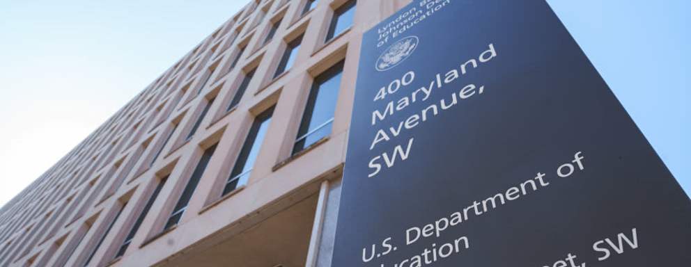 The US Department of Education sign marks the entrance to the federal building housing the agency's headquarters in Washington, DC.