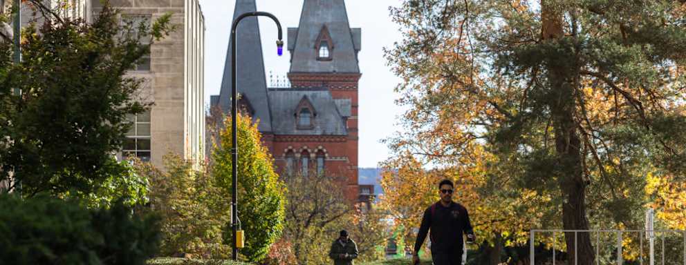 ITHACA, NEW YORK - NOVEMBER 3: People walk through the Cornell University campus on November 3, 2023 in Ithaca, New York. The university canceled classes after one of its students is accused of making violent antisemitic threats.