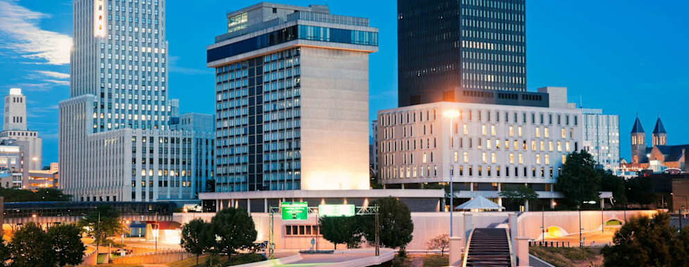 Skyline of Akron, Ohio, featuring several tall skyscrapers against a clear sky.