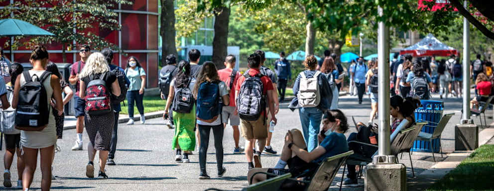 Taken in Stony Brook, N.Y. Students walk to classes on the campus at Stony Brook University in Stony Brook, New York on August 26, 2021.