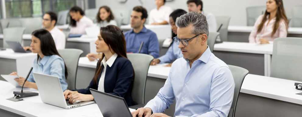 MBA students using technology