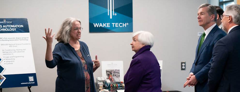 US Treasury Secretary Janet Yellen and North Carolina Governor Roy Cooper (2nd R) tour Wake Tech Community College East Campus on September 5, 2024