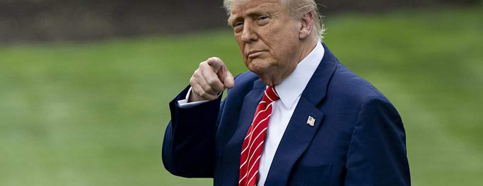 President Trump pointing toward camera