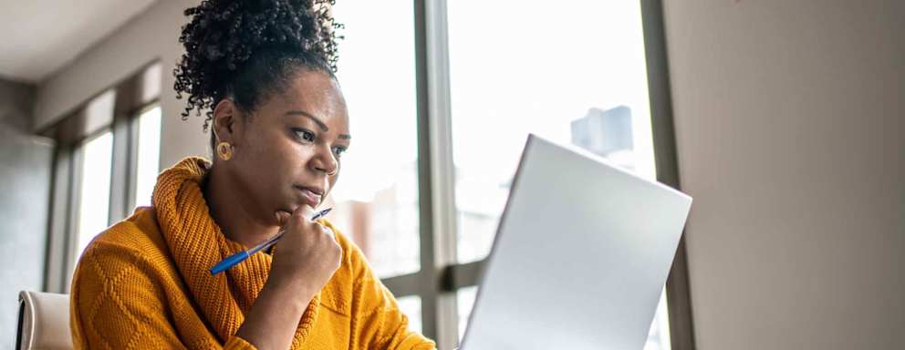 Black woman working from home office