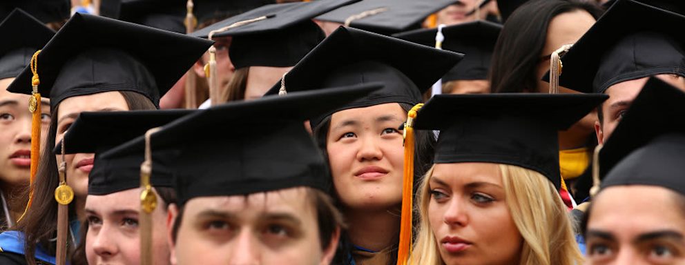 College graduates at commencement