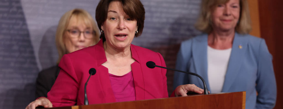 Sen. Amy Klobuchar speaking at a podium