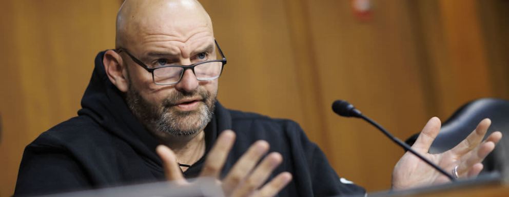US Senator John Fetterman, a Democrat from Pennsylvania, speaks during a Senate Banking, Housing, and Urban Affairs Committee hearing in Washington, DC, on December 6, 2023.