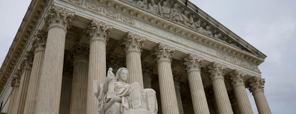 Exterior of the US Supreme Court Building on an overcast day in Washington, DC.