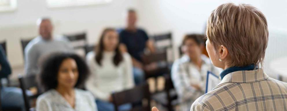 Therapist leading support group