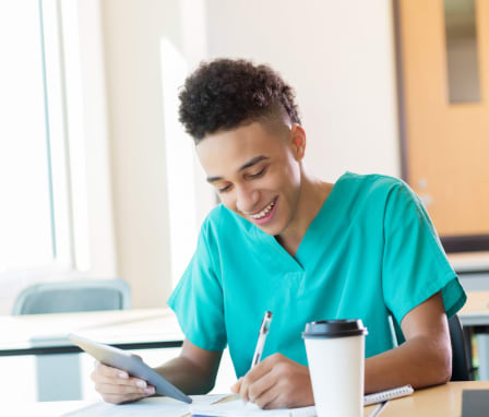 Nursing student taking notes