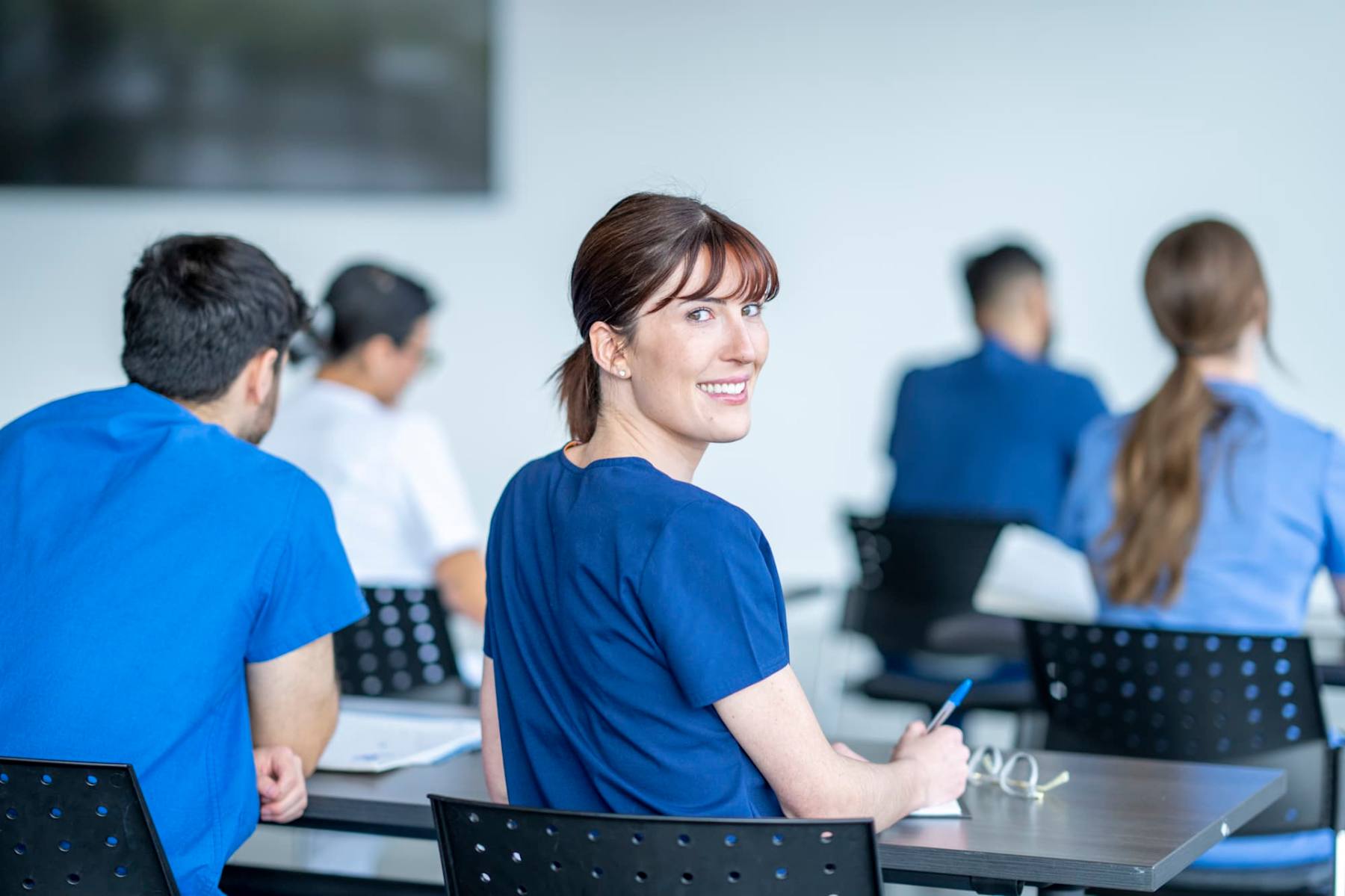 Nurse listening to a lecture