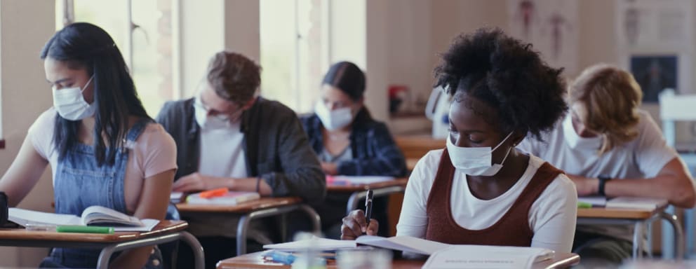 High school students wearing masks in a classroom