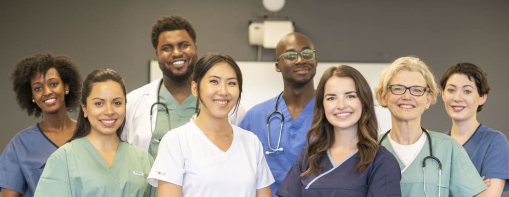 Group of nurse practitioners smiling together