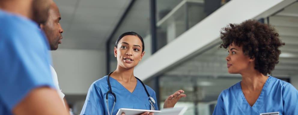 Nurses talking to and supporting each other