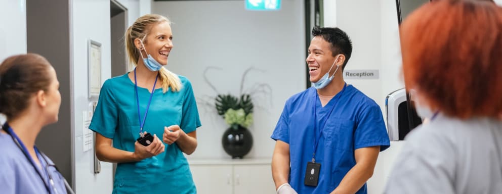 Nurses working together and smiling