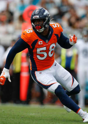 Von Miller running on the field during the game between the Denver Broncos and the Jacksonville Jaguars on September 19, 2021.