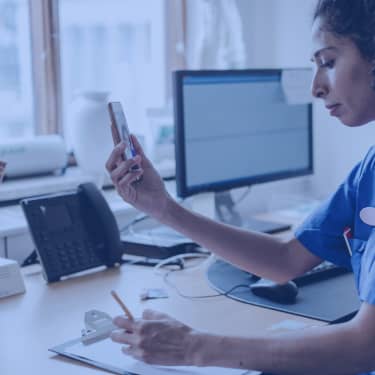 medical professional working at desk