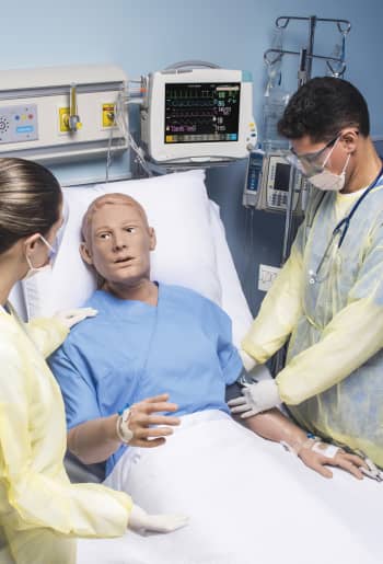 Two nursing students tending to Emory HAL