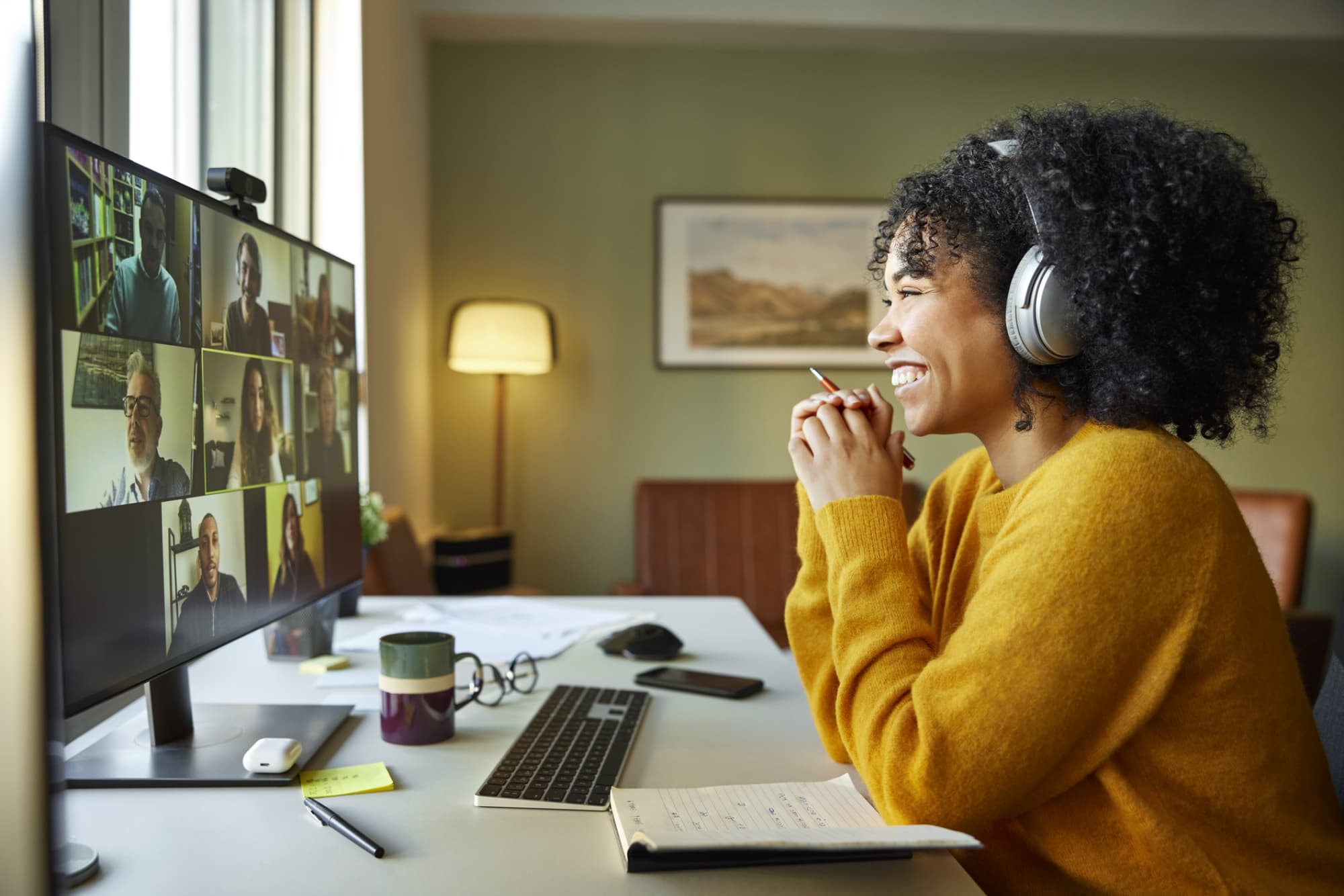 https://res.cloudinary.com/highereducation/images/f_auto%2Cq_auto/v1664903872/CyberDegrees.org/Woman-smiling-video-call-computer-headphones/Woman-smiling-video-call-computer-headphones.jpg?_i=AA
