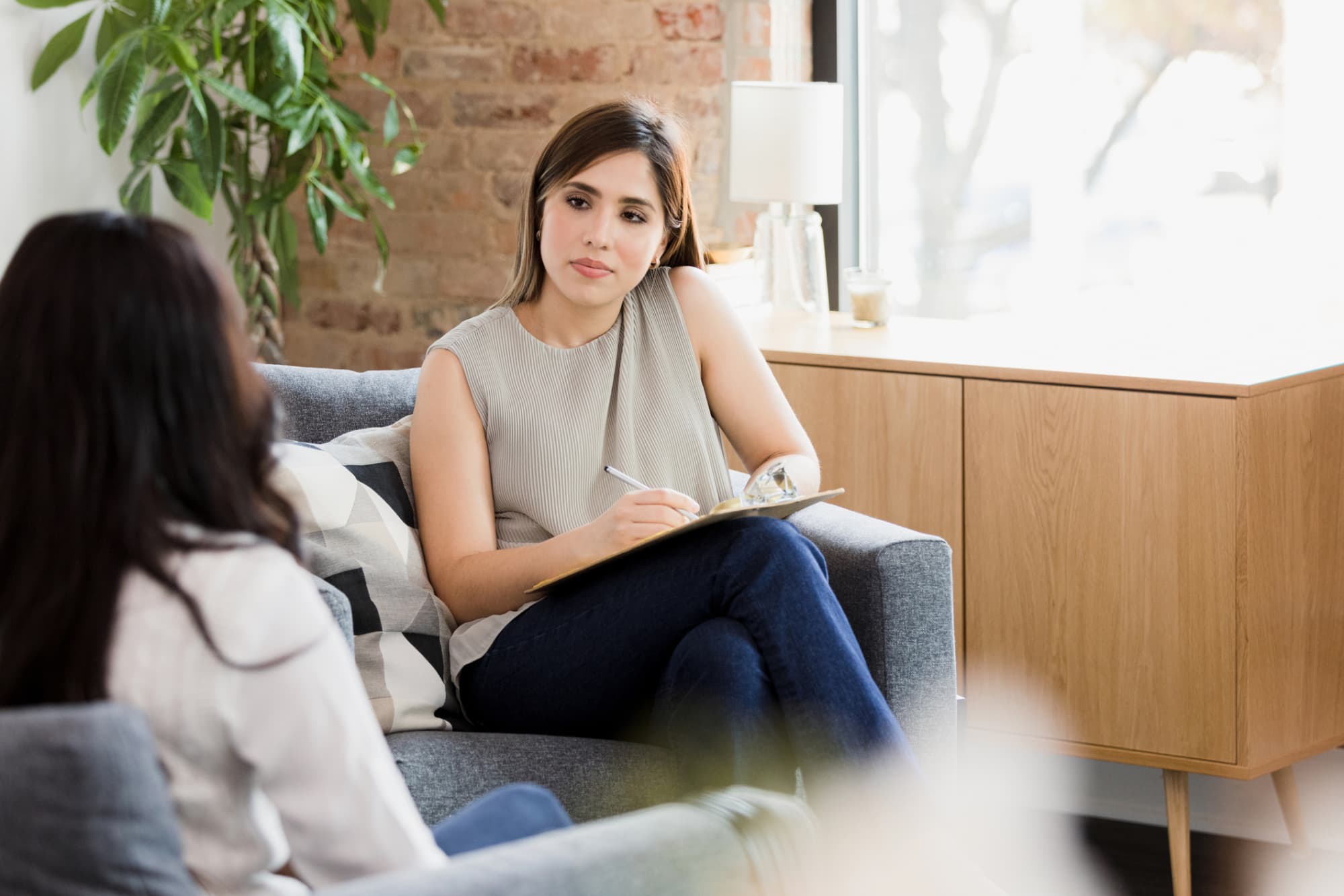 Woman counselor talking to patient