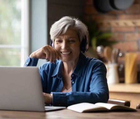 Senior woman on laptop at home