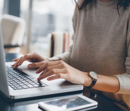 Woman using her laptop