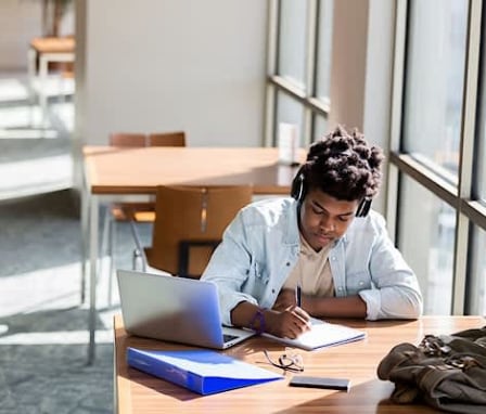 Student studying in library