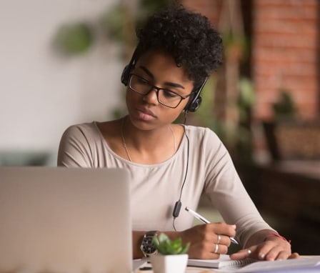 Woman studying at laptop