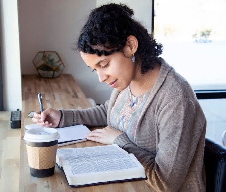 Woman studying bible