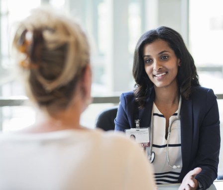 Healthcare professional talking to a patient