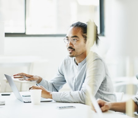 Man talking to other in meeting