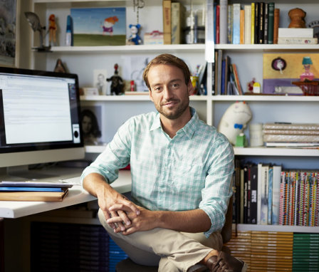 Man on computer in home office