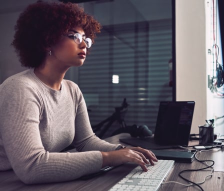 computer typing and black woman programmer, software developer and cybersecurity internship. Coding, programming and USA person or developer data analytics, information technology and research