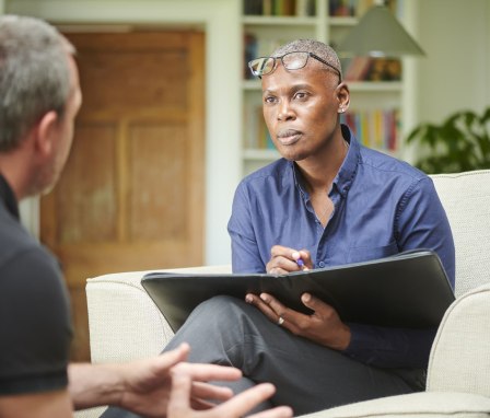 Counselor listening to patient