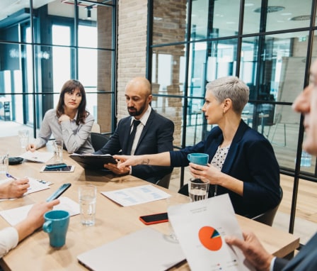 People at table having business meeting